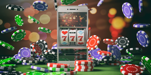 illustration d'un smartphone avec un jeu de machine à sous et des jetons de casino