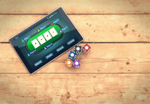 vue aérienne d'une tablette sur laquelle est lancée un jeu de casino